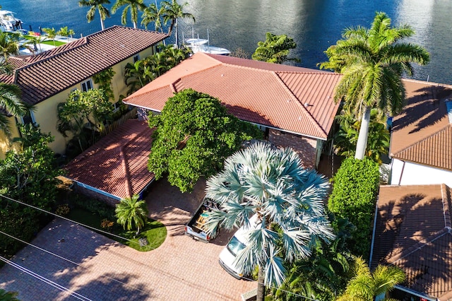 birds eye view of property featuring a water view