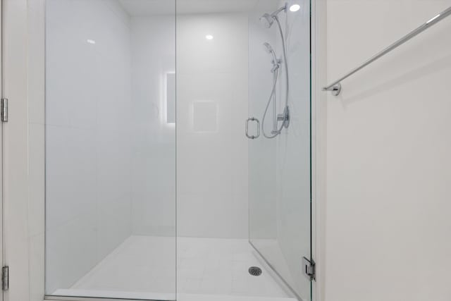 bathroom with an enclosed shower