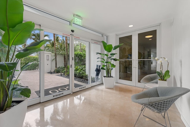 sunroom / solarium with french doors