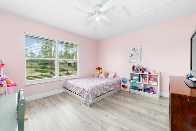 bedroom featuring ceiling fan and light hardwood / wood-style flooring