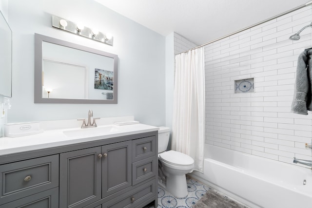 full bathroom with vanity, toilet, and shower / bath combo with shower curtain