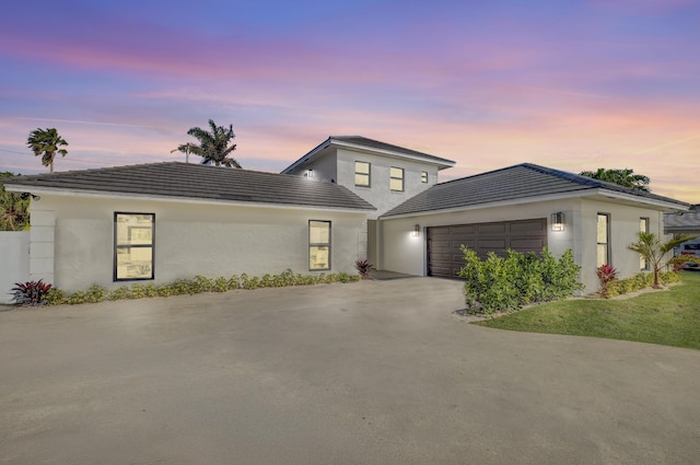 view of front of property featuring a garage