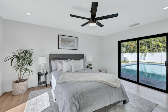 bedroom with ceiling fan, light wood-type flooring, and access to outside