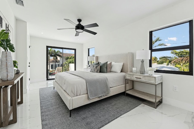 bedroom with ceiling fan and access to outside