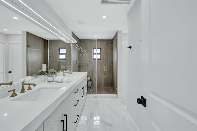 bathroom with vanity, toilet, and an enclosed shower