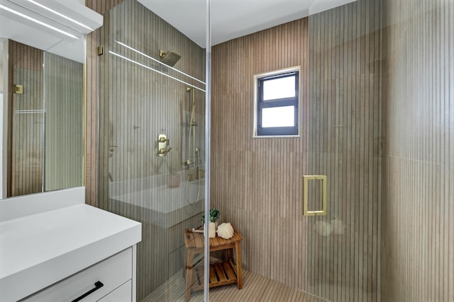 bathroom with vanity and an enclosed shower