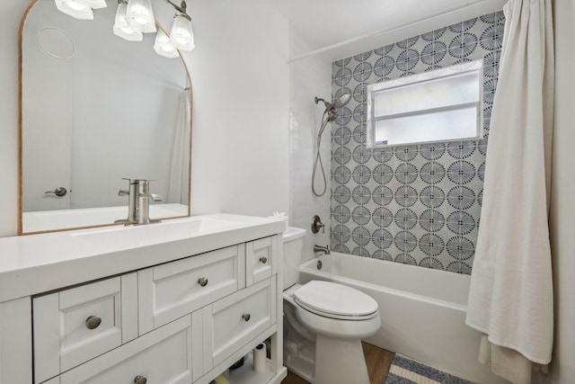 full bathroom with vanity, toilet, and shower / tub combo