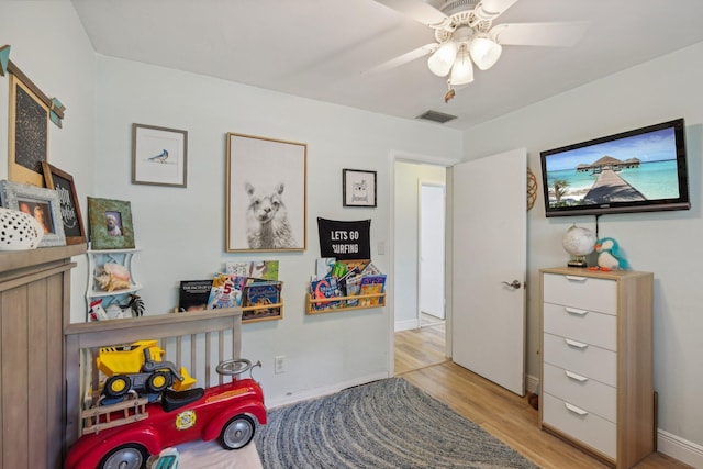 interior space featuring light hardwood / wood-style floors and ceiling fan