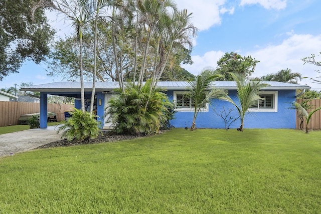 view of yard with a carport