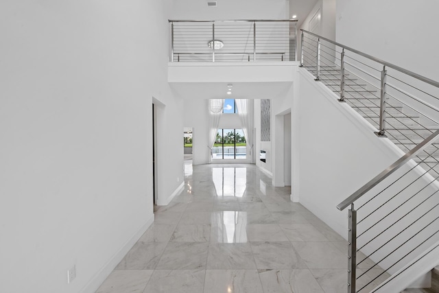 foyer with a high ceiling