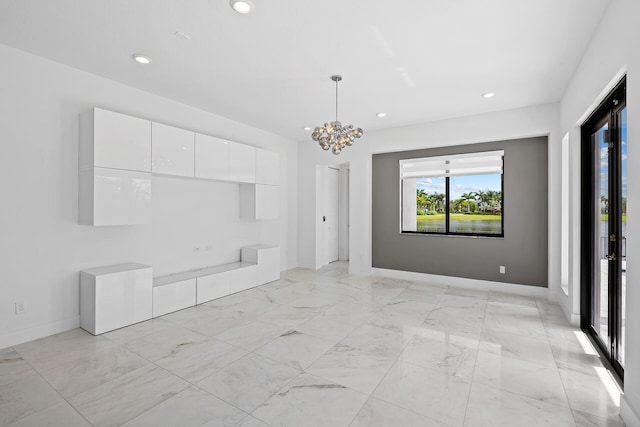 interior space featuring a notable chandelier