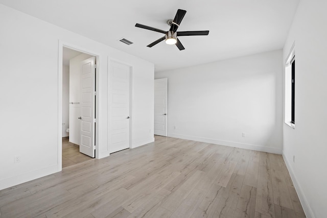 unfurnished bedroom with light hardwood / wood-style flooring and ceiling fan