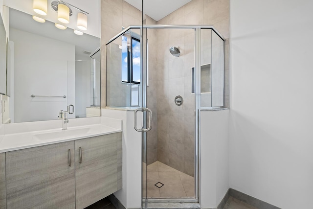 bathroom featuring vanity and walk in shower