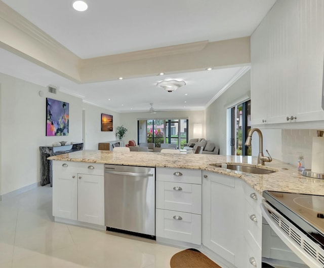 kitchen with sink, white cabinetry, light stone counters, stainless steel dishwasher, and kitchen peninsula