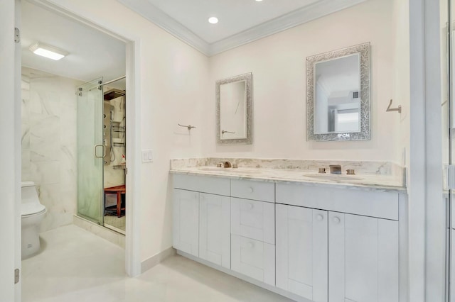 bathroom with vanity, a shower with shower door, ornamental molding, and toilet