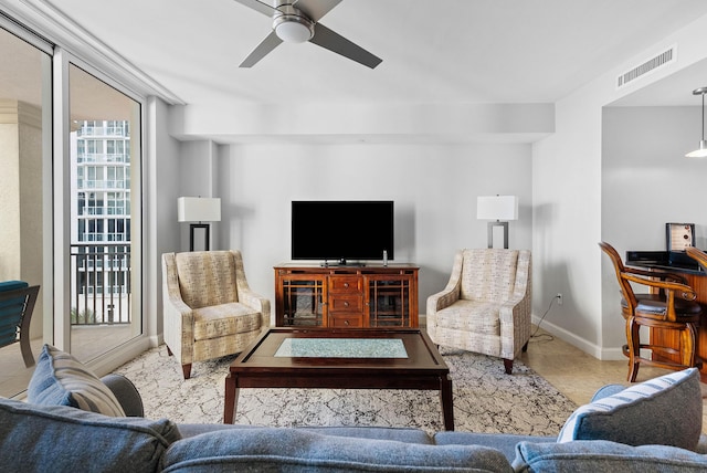 living room featuring ceiling fan