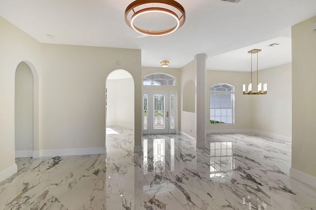 foyer featuring french doors