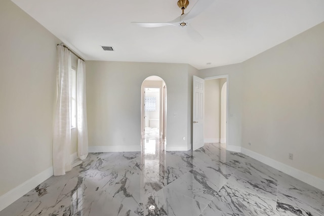 unfurnished room featuring ceiling fan