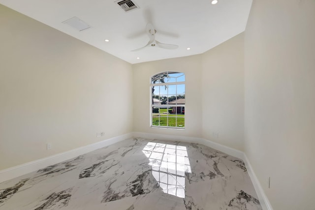 spare room with ceiling fan