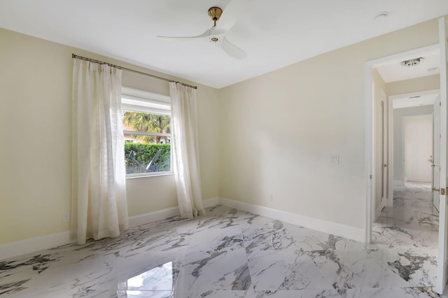 spare room featuring ceiling fan