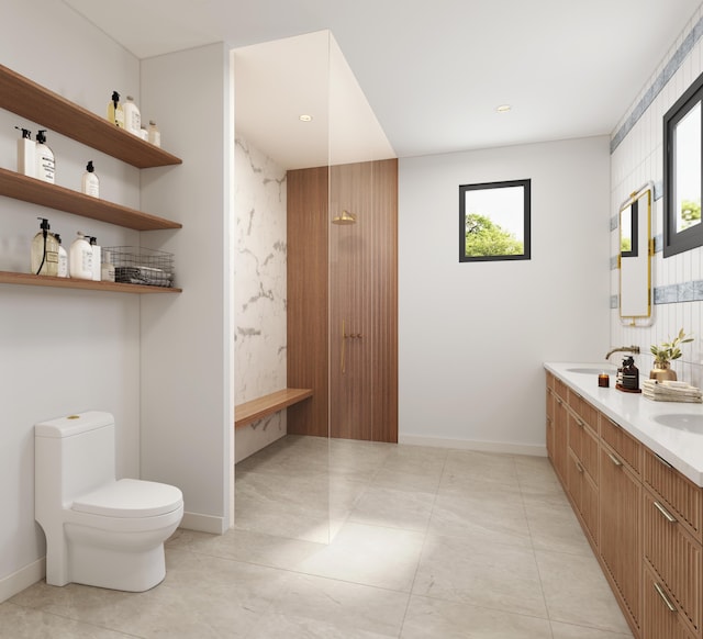 bathroom featuring tile patterned flooring, vanity, toilet, and walk in shower