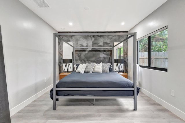 bedroom featuring hardwood / wood-style flooring