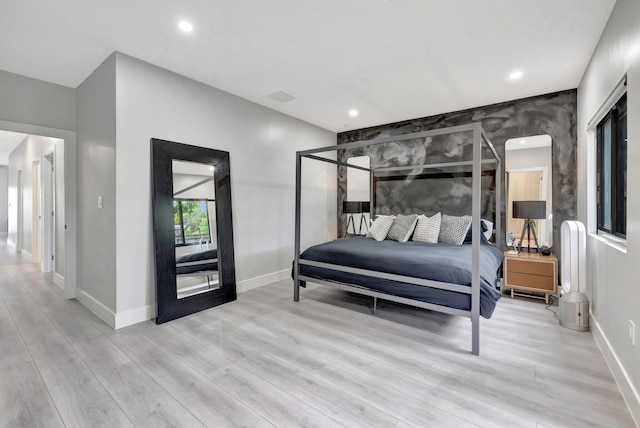 bedroom featuring light hardwood / wood-style flooring