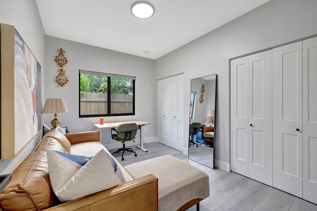 office area with light hardwood / wood-style floors