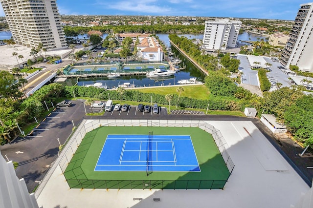 birds eye view of property featuring a water view