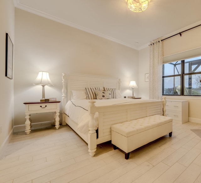 bedroom featuring light hardwood / wood-style floors and ornamental molding