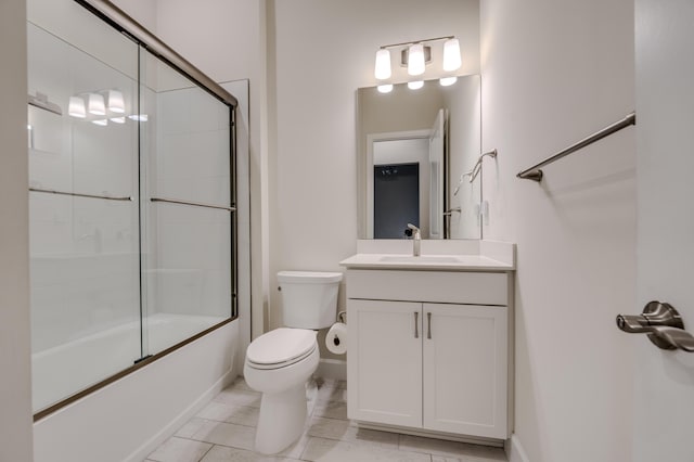 full bathroom with tile patterned floors, vanity, toilet, and enclosed tub / shower combo