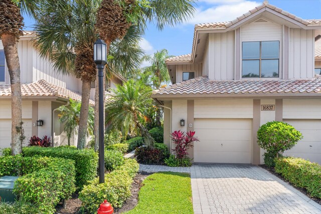 view of front of home with a garage