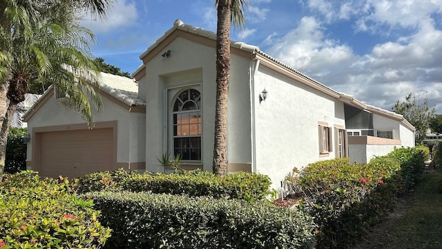 view of home's exterior featuring a garage