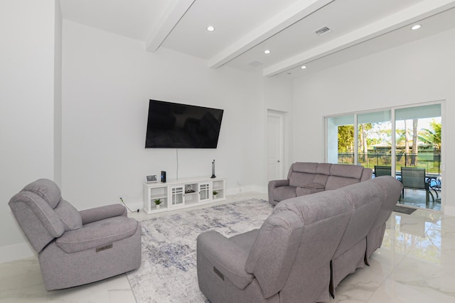 living room featuring beamed ceiling