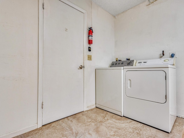 laundry area with washer and clothes dryer