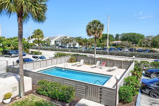 view of swimming pool featuring a patio