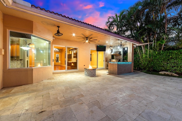 view of patio / terrace featuring ceiling fan