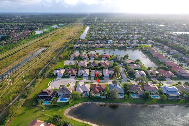 drone / aerial view featuring a water view