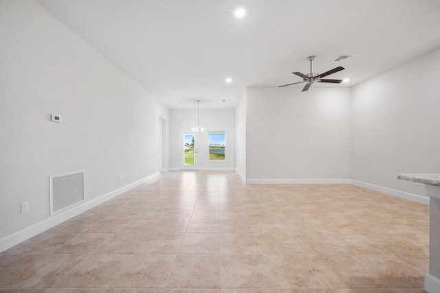 unfurnished room featuring light tile patterned floors and ceiling fan