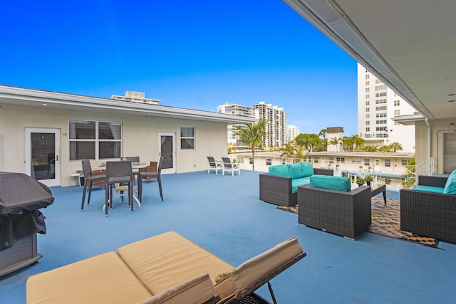 exterior space with a grill and an outdoor living space