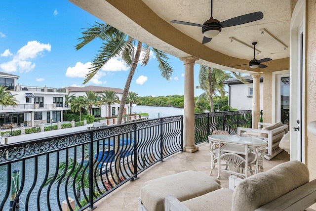 791 NE Marine Dr, Boca Raton, FL 33431 - balcony featuring a water view and ceiling fan