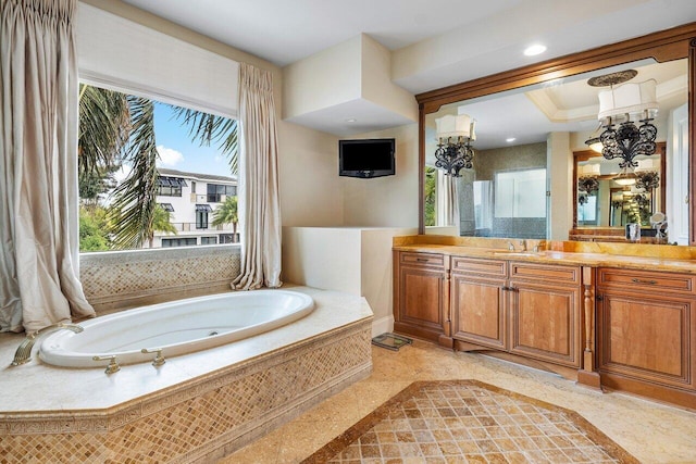 791 NE Marine Dr, Boca Raton, FL 33431 - full bathroom with inlaid floor details, a jetted tub, and vanity