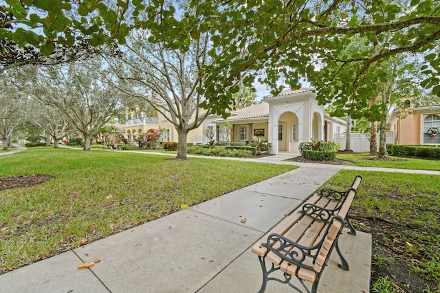 view of front of home with a front lawn