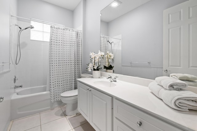 full bathroom with tile patterned flooring, vanity, shower / bath combination with curtain, and toilet