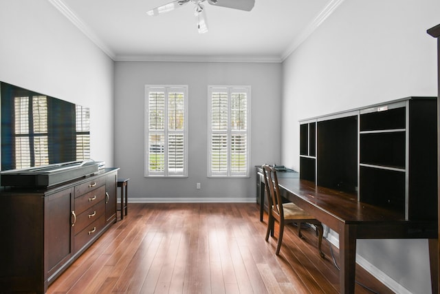 office area featuring crown molding, light wood-type flooring, and ceiling fan