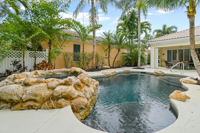 view of swimming pool featuring a patio area