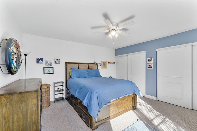 bedroom featuring ceiling fan and light colored carpet