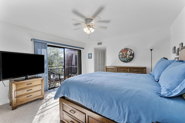 bedroom with access to exterior, ceiling fan, and light carpet