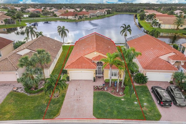 drone / aerial view featuring a water view