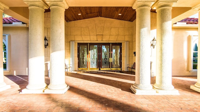 entrance to property featuring french doors